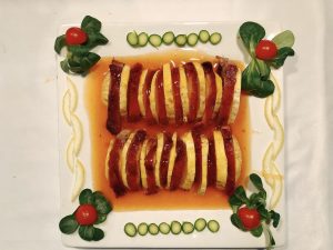 Pato asado en salsa de piel de naranja (o con fruta de mango)