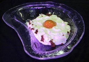 Smoked sheep curd with mango yolk, false fried egg